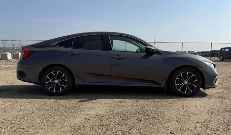 
								2021 Honda Civic LX full									